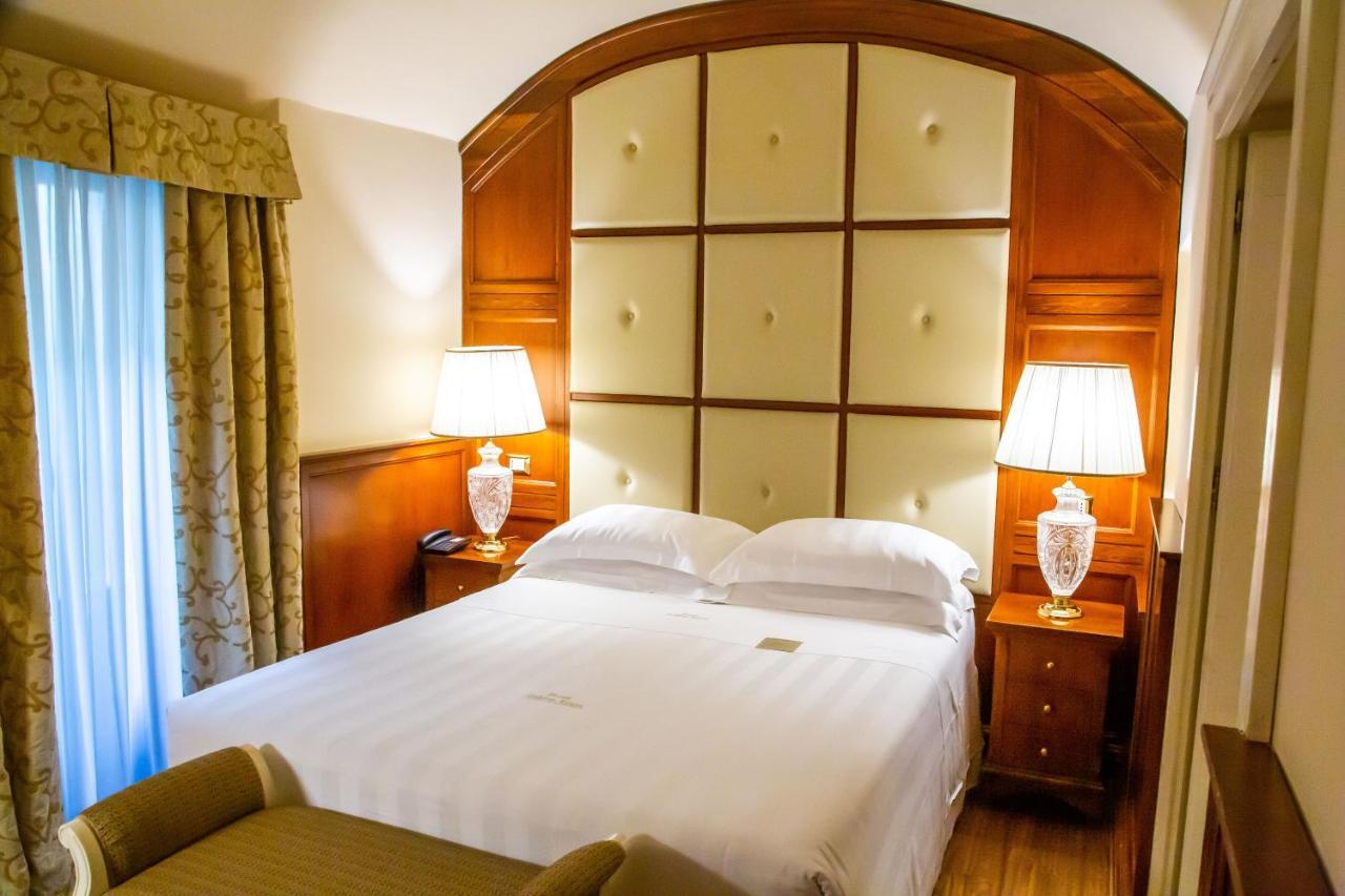 פירנצה Golden Tower Hotel & Spa מראה חיצוני תמונה A bedroom at the hotel