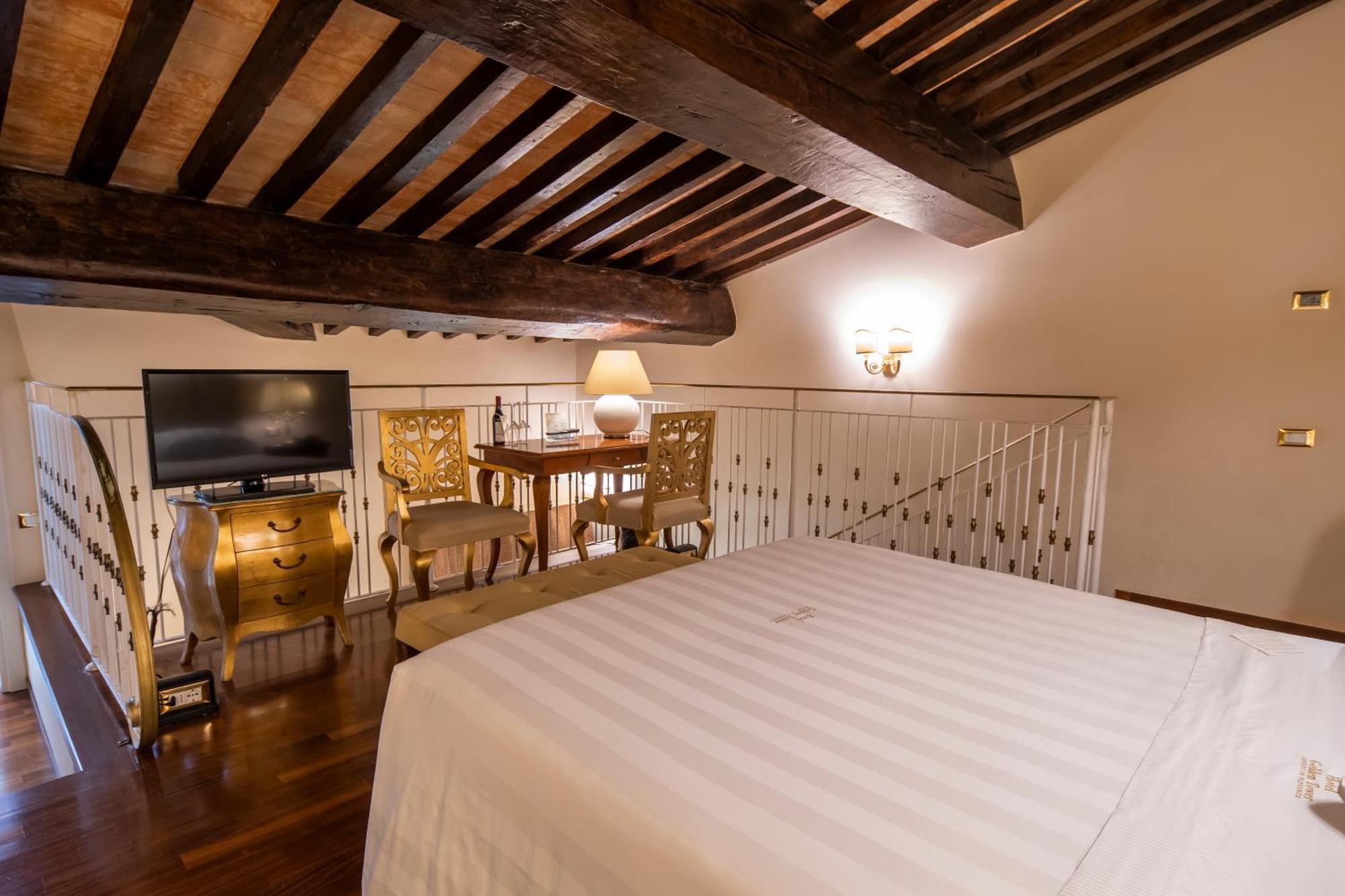 פירנצה Golden Tower Hotel & Spa מראה חיצוני תמונה A room at the hotel