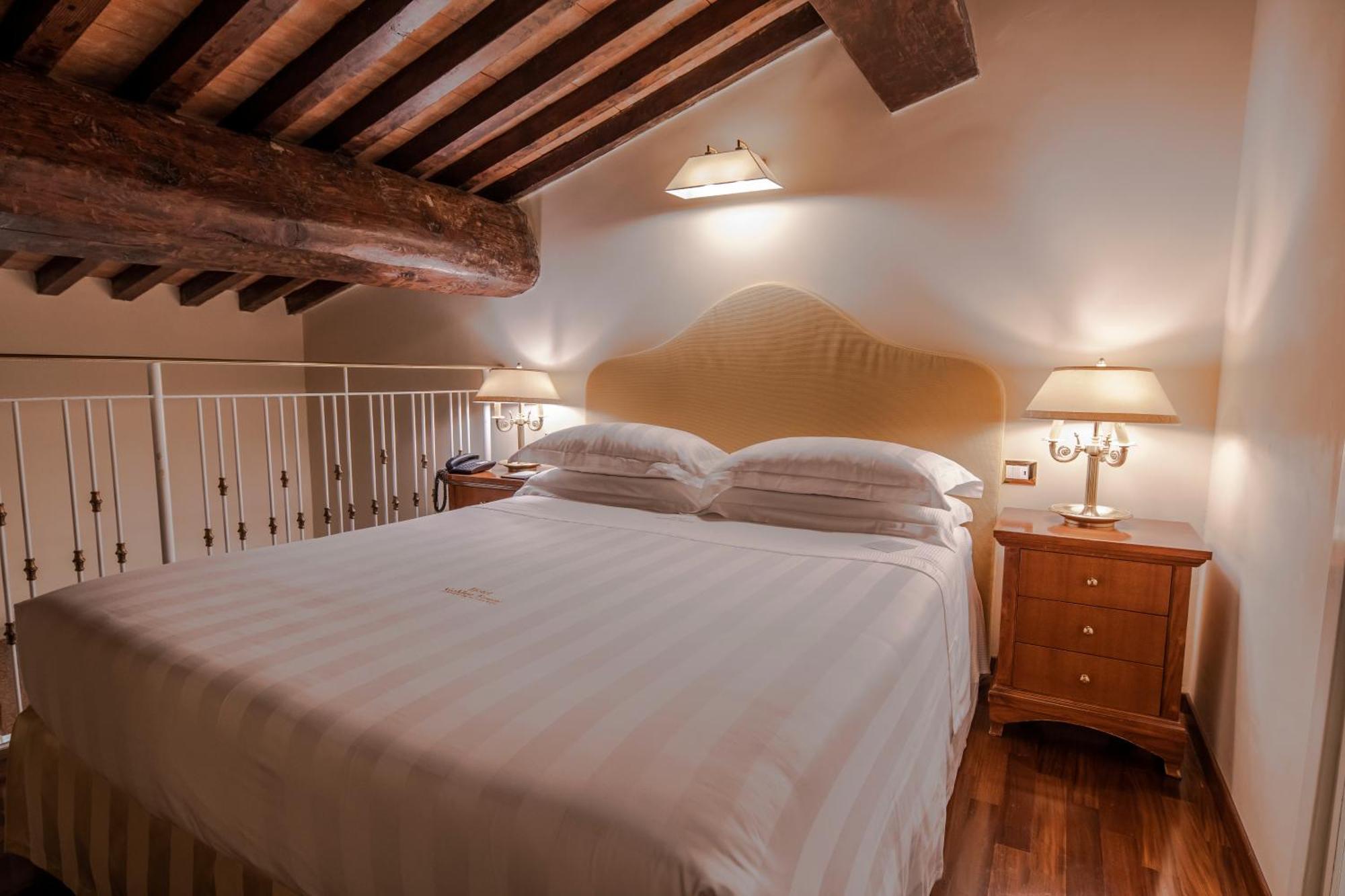 פירנצה Golden Tower Hotel & Spa מראה חיצוני תמונה A bedroom at the hotel