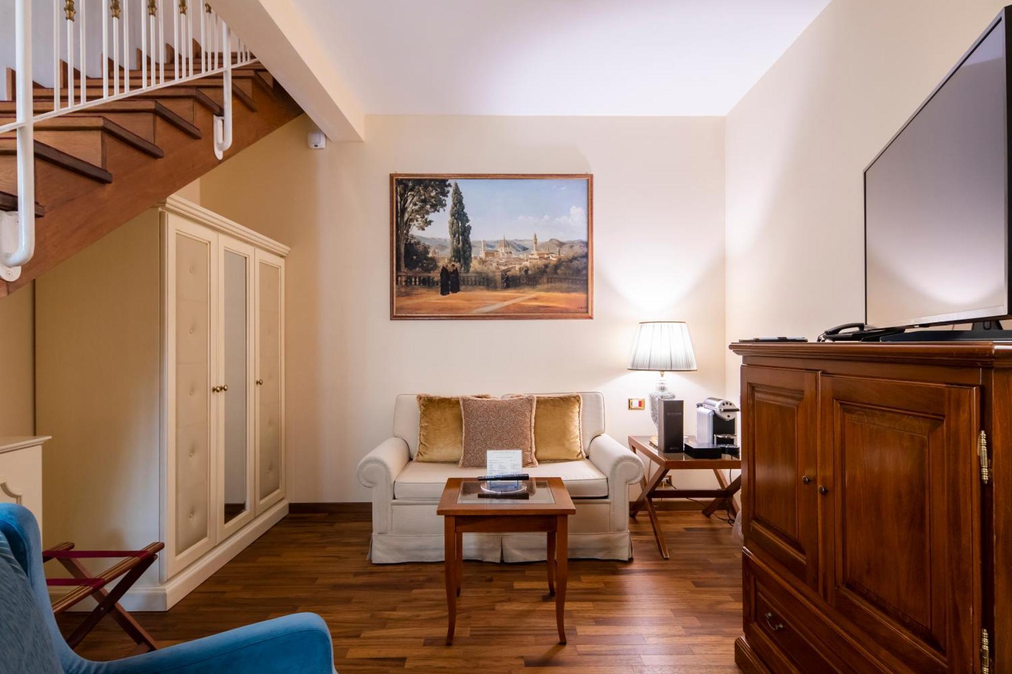 פירנצה Golden Tower Hotel & Spa מראה חיצוני תמונה A room at the hotel