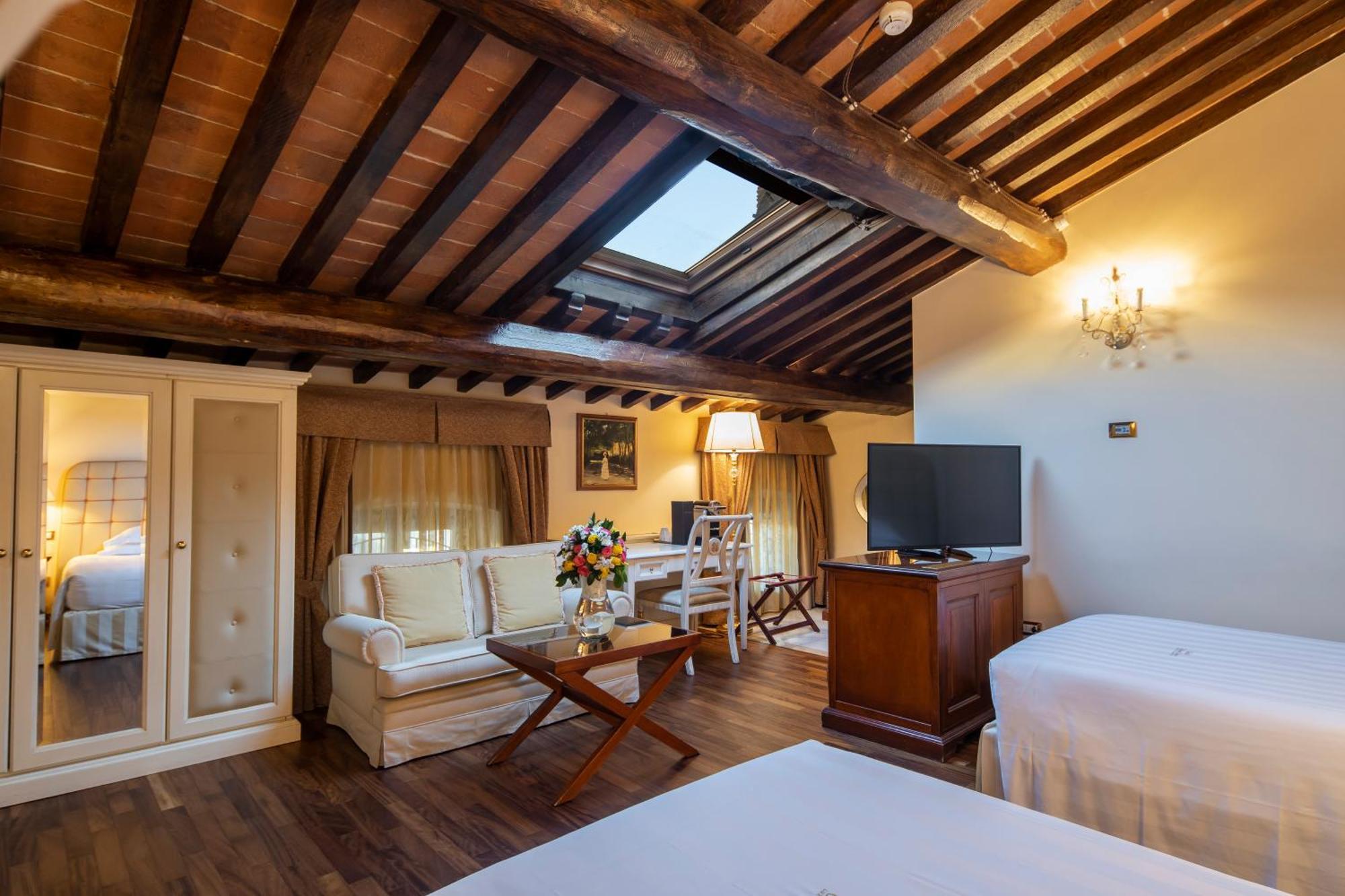 פירנצה Golden Tower Hotel & Spa מראה חיצוני תמונה A room at the hotel