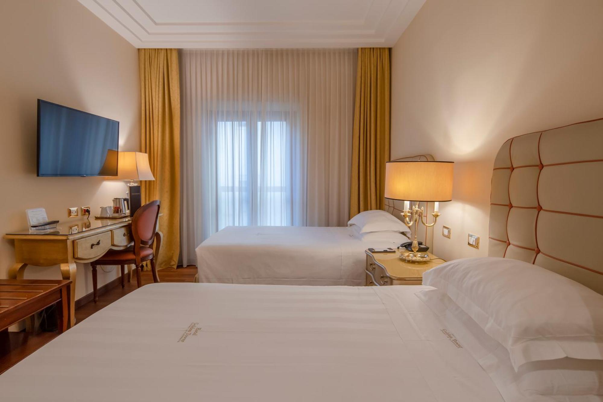 פירנצה Golden Tower Hotel & Spa מראה חיצוני תמונה A room at the hotel